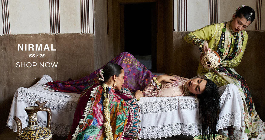 Hussain Rehar , Nirmal SS25, Luxury Lawn, Two women in traditional designer attire sitting around a table with a third woman lying down in a veranda