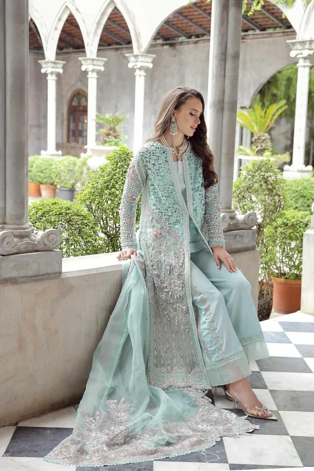 Maryam Hussain RAHA Festive weddings unstitched suit Alara, featuring intricate silver embroidery on light blue Organza