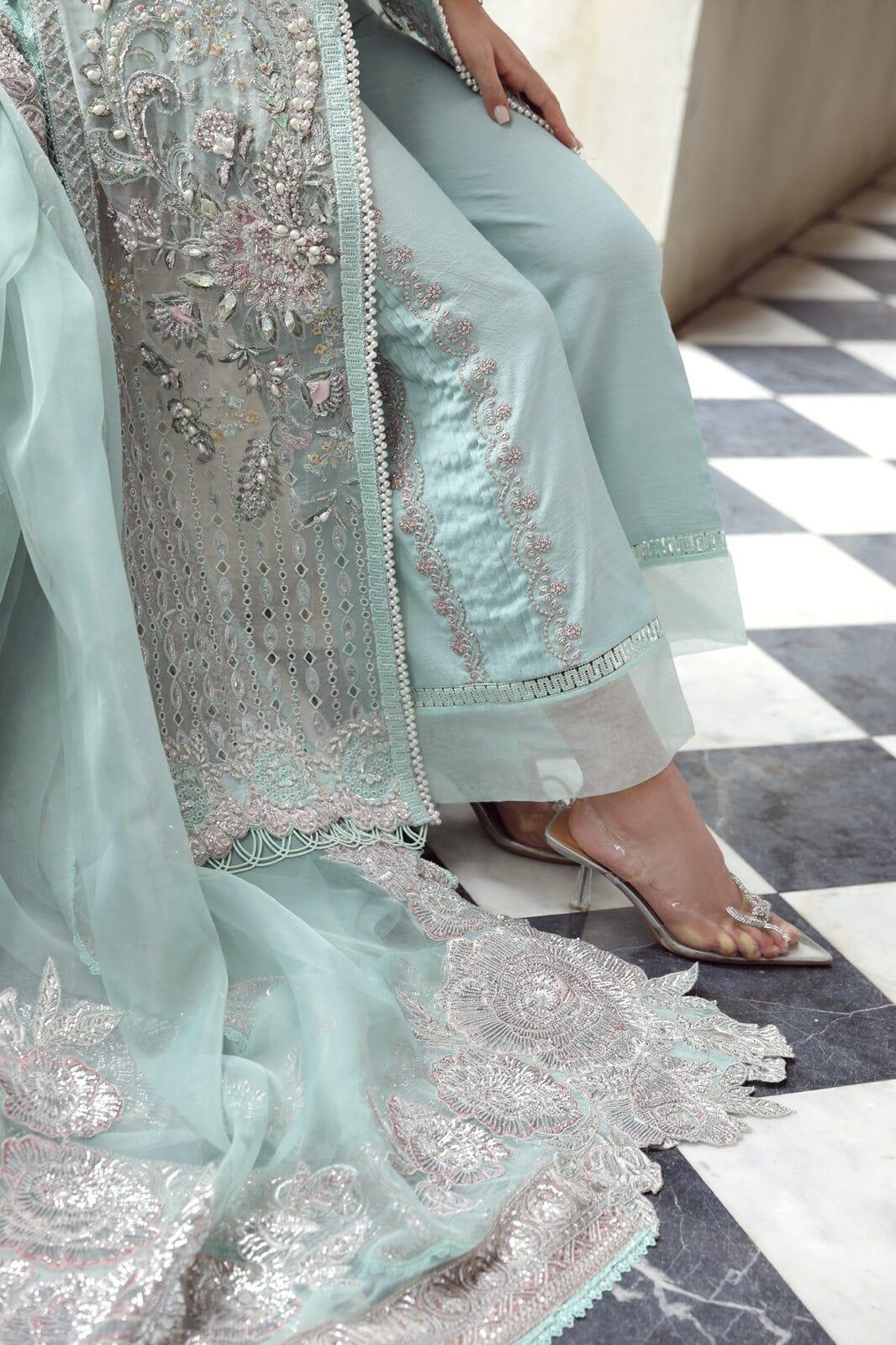 Maryam Hussain RAHA Festive weddings unstitched suit Alara, featuring intricate silver embroidery on light blue Organza