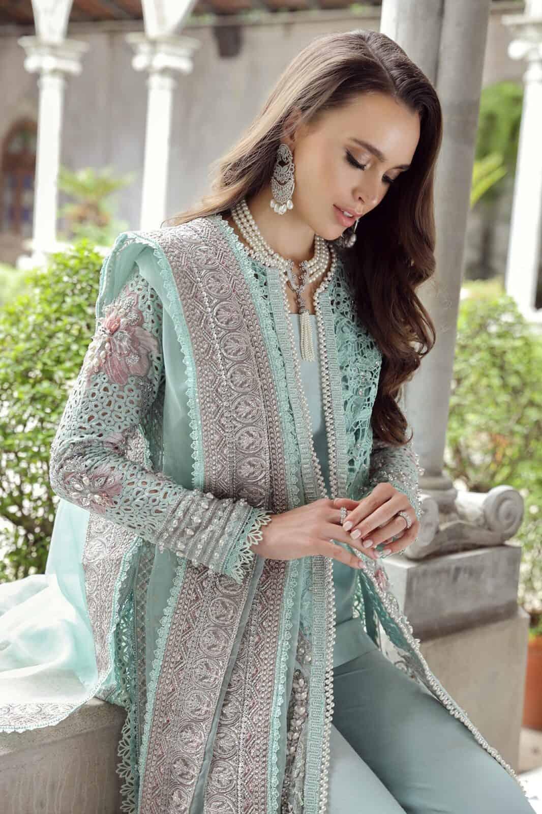 Maryam Hussain RAHA Festive weddings unstitched suit Alara, featuring intricate silver embroidery on light blue Organza